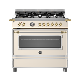 Fogão Bertazzoni Heritage HER96L1EAVGT na cor marfim e dourado.